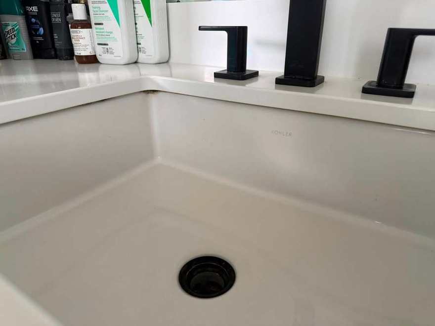 A bathroom vanity left clean and spot-free after a visit from The Clean Technique